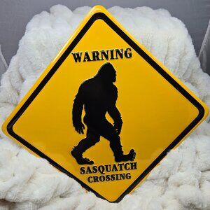 Bigfoot "Warning Sasquatch Crossing" Black and Yellow Metal Sign w/ Hanger (NWT)